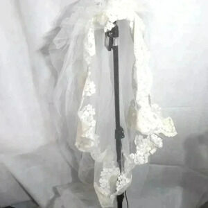 1968 Foley's Bridal Veil with 7 foot 84 in train. Mesh and lace cathedral